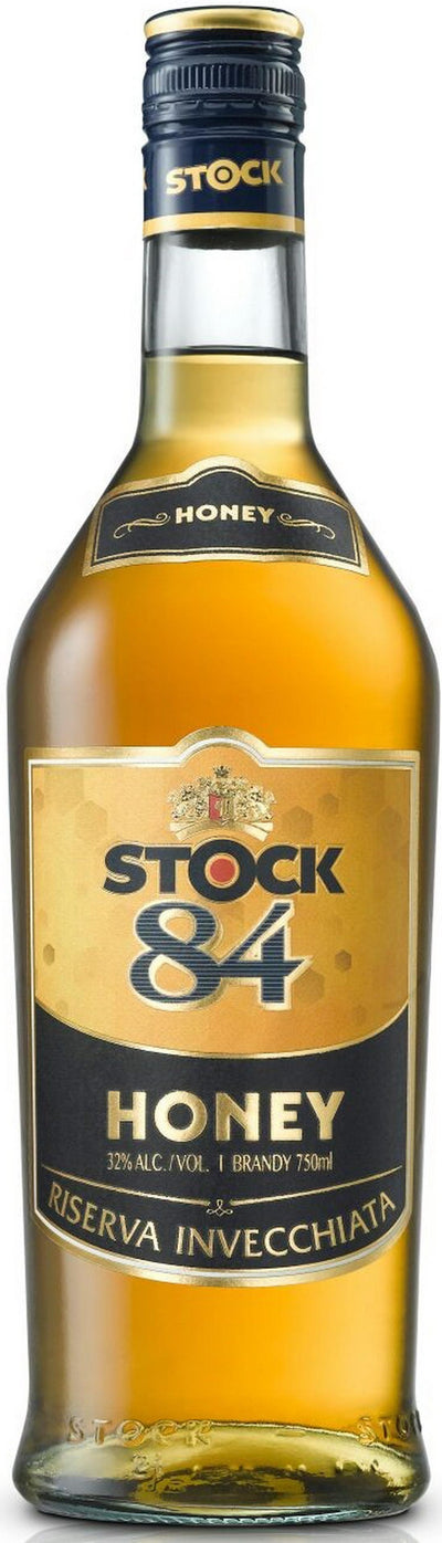 בקבוק ברנדי סטוק 84 דבש 700 מ''ל עם תערובת דבש ותוויות מעוצבות כולל טעם 'Riserva Invecchiata'|